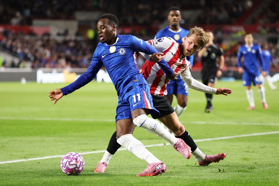 Jamie Gittens of Chelsea battling for possession during a soccer match.