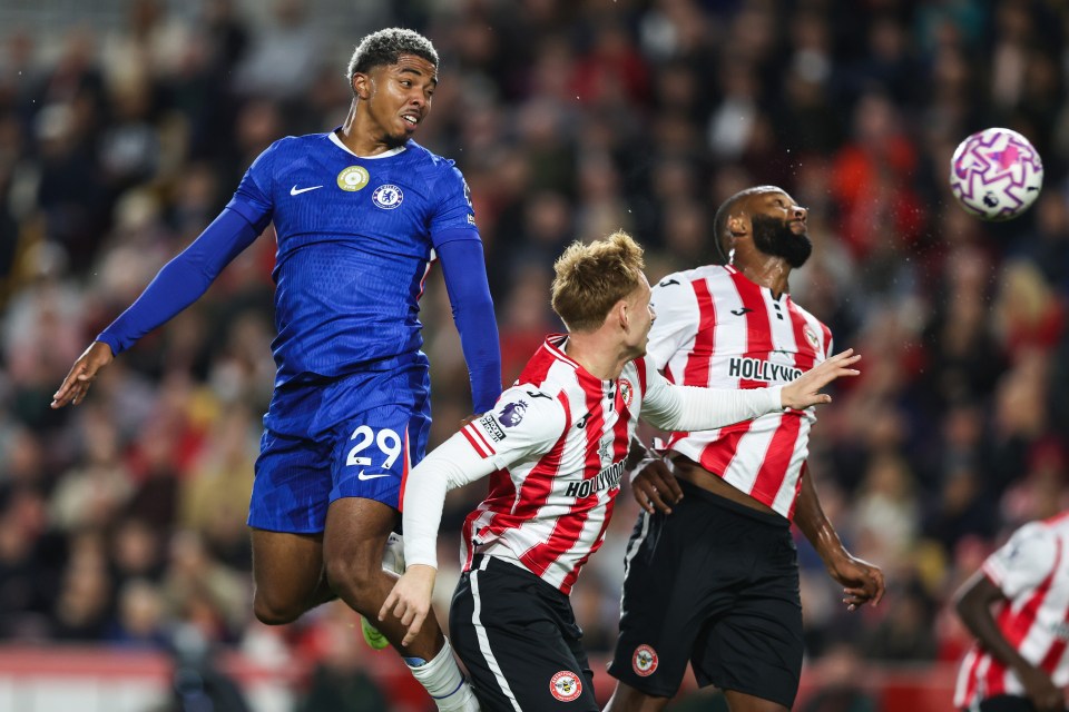 Wesley Fofana of Chelsea heads the ball during a Premier League match.