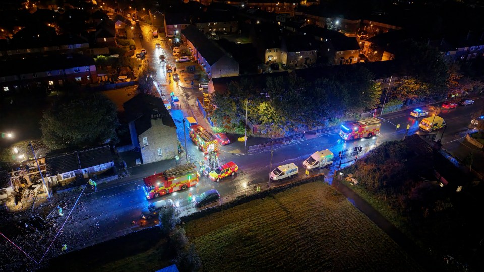 Aerial view of emergency services responding to a house explosion in Bradford.