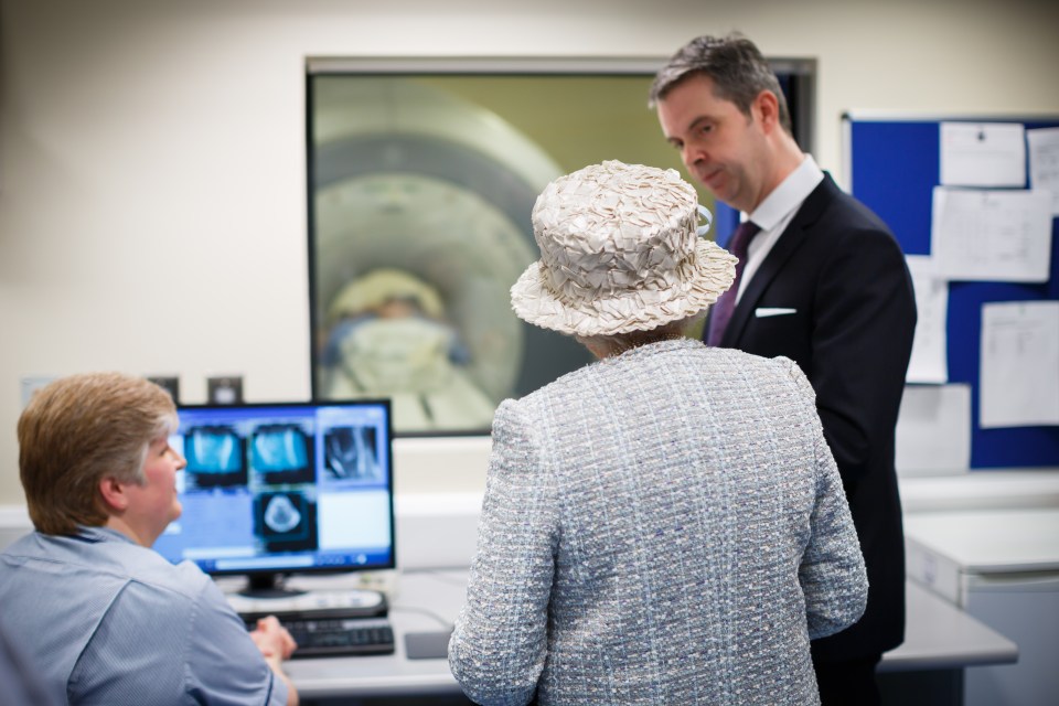 Queen Elizabeth II visiting an MRI control room.