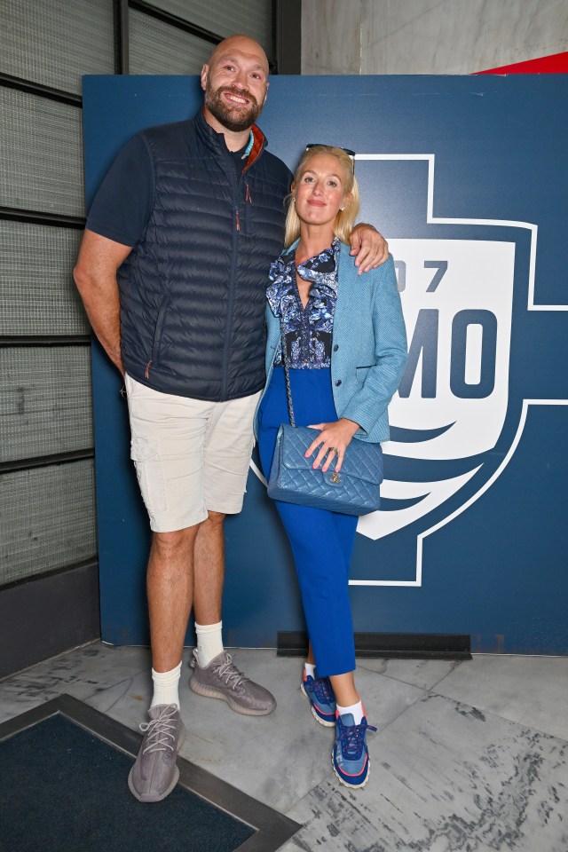 Tyson Fury and Paris Fury at a stadium.
