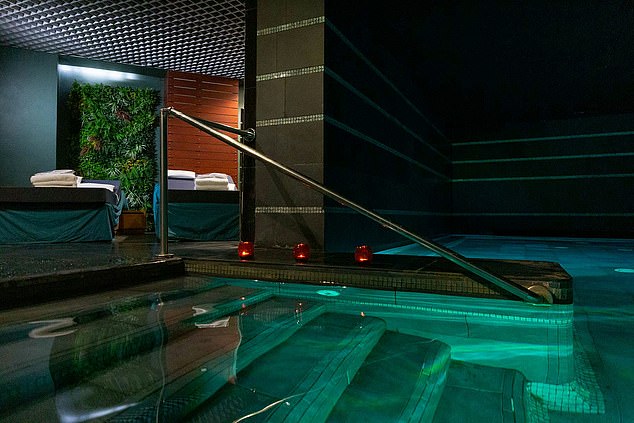 In addition to the sauna and treatment rooms, the spa contains a heated pool which is lit up in calming colours