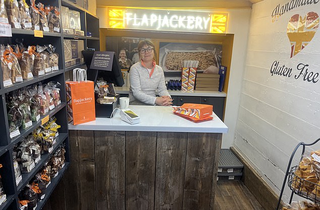 Pictured: shopkeeper Ewa Bubczyk, who thinks unreliable weather is the biggest tourist deterrent
