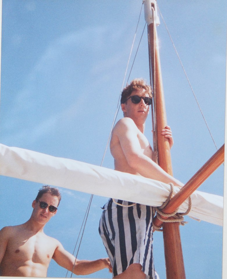 Photo of twin brothers on a sailboat.