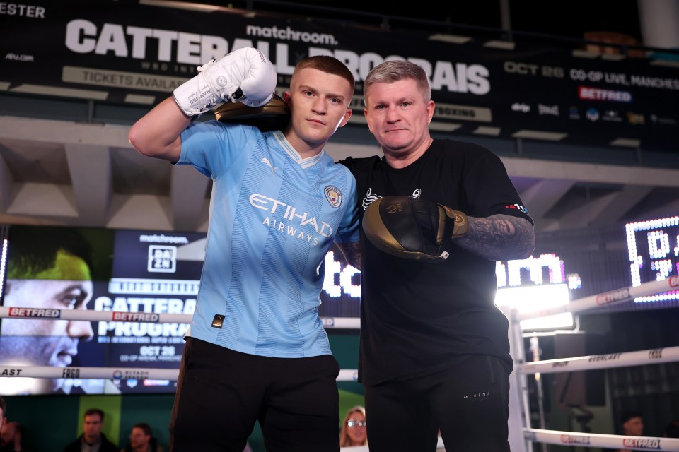 Campbell and Ricky Hatton at a boxing event.