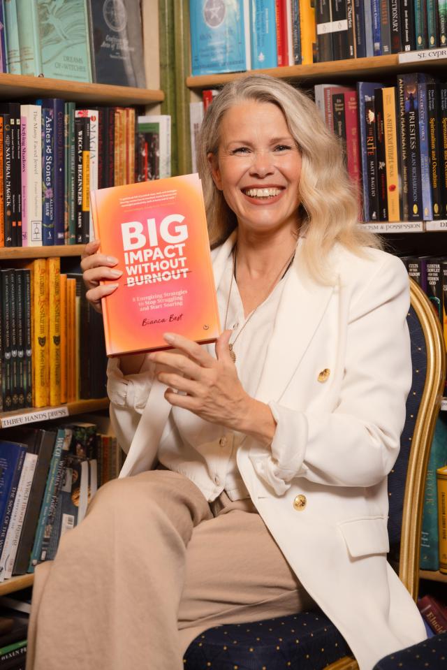 Bianca Best holding her book, *Big Impact Without Burnout*.