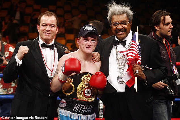 Hatton is pictured with promoters Dennis Hobson (left) and Don King (right)