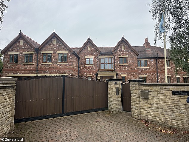 The boxing icon was found at his home in Greater Manchester this morning, where a police cordon currently sits outside. He had a Manchester City flag in the front garden