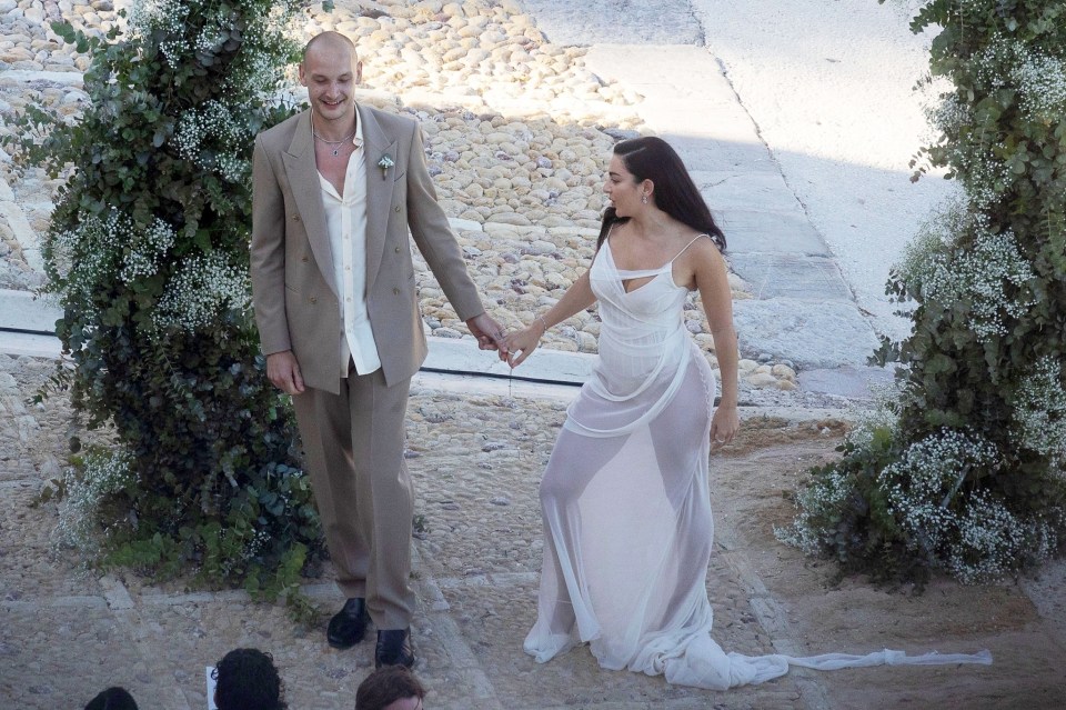 Charli XCX and George Daniel at their Italian wedding.
