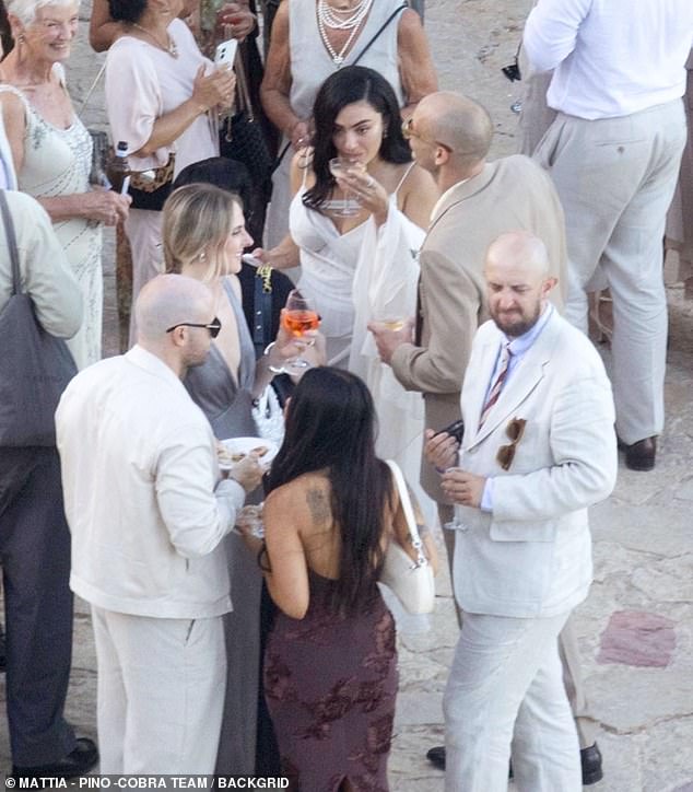 In true musician style, after the heartfelt service Charli and George wasted no time in getting into the celebrations with their guests