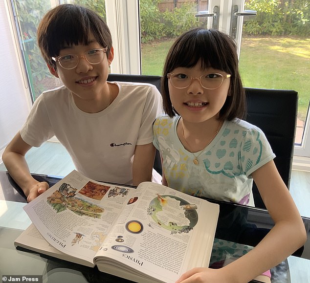 Elias, from Burton upon Trent in Staffordshire, has always been ahead of the curve, and later this month, he will begin a biomedical engineering degree at Imperial College London. Pictured: Elias studying with his little sister, Ariel