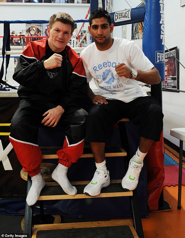 Ricky Hatton poses for a photograph with Amir Khan during a training session at the IBA Gym on April 28, 2009 in Las Vegas, Nevada. Hatton fights Manny Pacquiao on Saturday 02, May 2009 at The MGM Grand Garden Arena at the MGM Grand Hotel and Casino in Las Vegas.  (Photo by Denise Truscello/Getty Images)