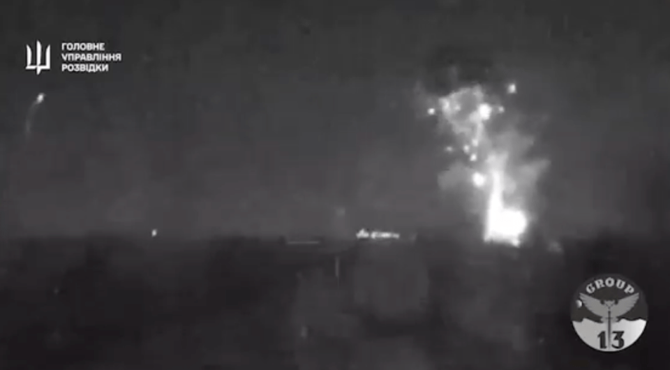 Night vision footage of an explosion.