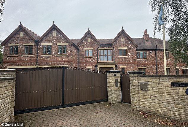 The boxing icon was found at his home (pictured) in Greater Manchester this morning, where a police cordon currently sits outside. His death is not being treated as suspicious