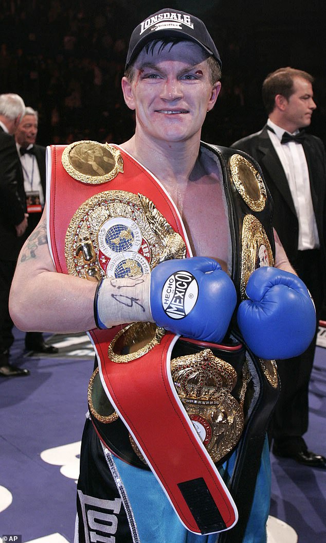 The British boxing icon celebrates after winning the WBA light-welterweight title when he defeated Carlos Maussa