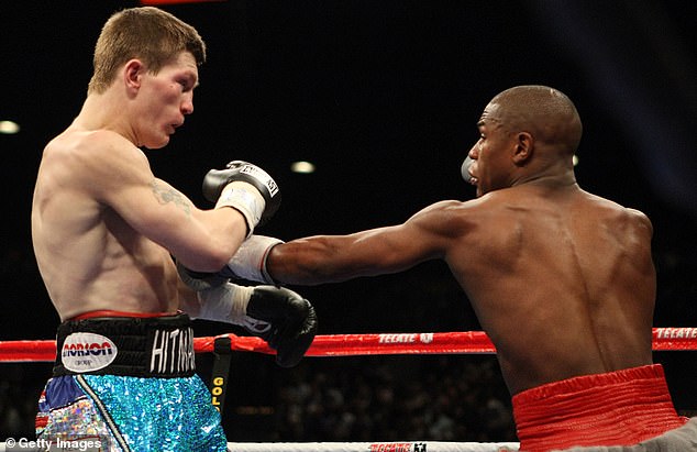 His parents installed a gym in the cellars for him when he was 12, which punters would come down to to cheer him on as he hit the bag over and over. Pictured: Mr Hatton fighting Floyd Mayweather in 2007