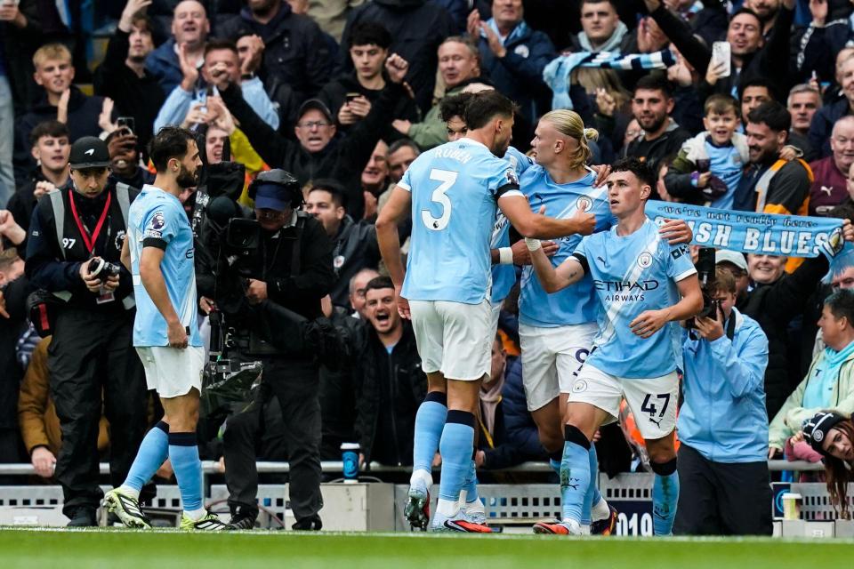 Phil Foden of Manchester City celebrating a goal.
