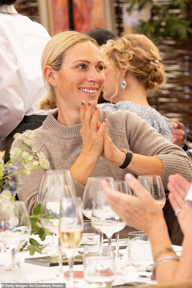 Meanwhile Princess Anne's daughter Zara Tindall, who is an equestrian, donned a tan sweater after her day of horseriding