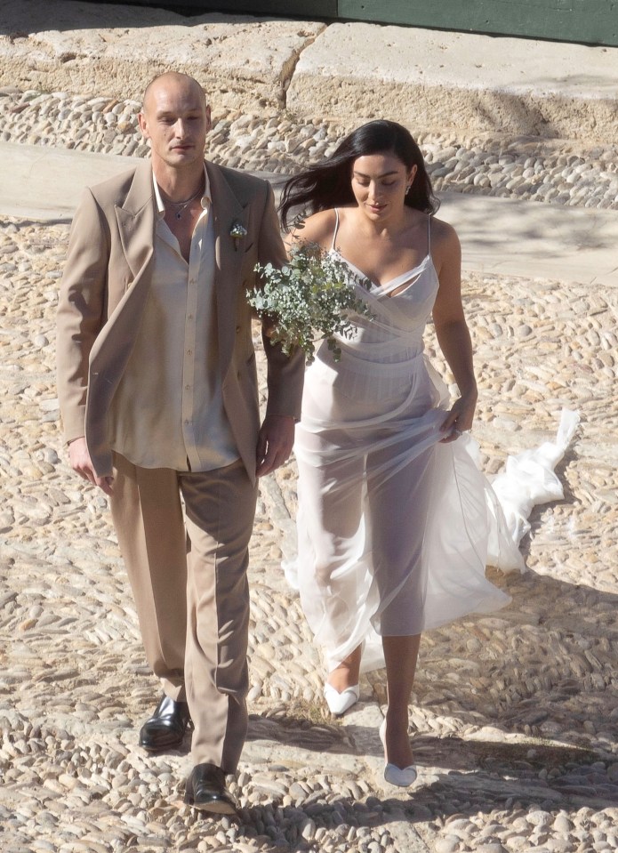 Charli XCX and George Daniel at their Italian wedding.