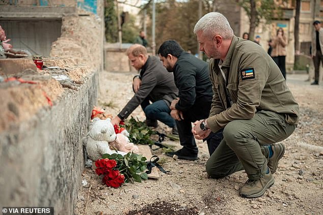 Prince Harry pays tribute to victims killed in recent Russian drone and missile strikes at the site of a heavily damaged apartment building in Kyiv -- September 12, 2025