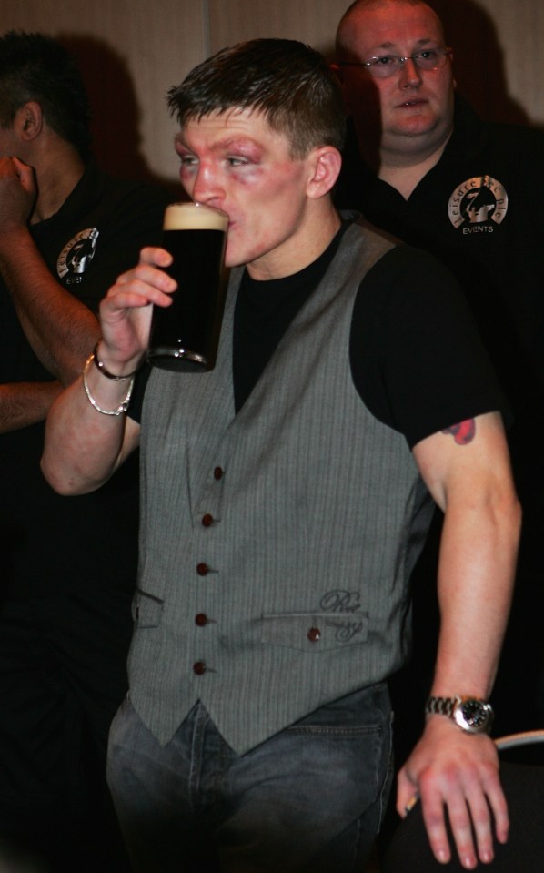 Ricky Hatton drinking a pint of beer at a post-fight party.