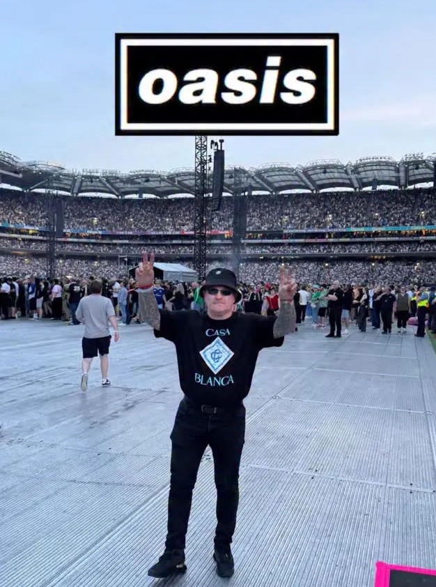 Person at Oasis concert in Dublin.