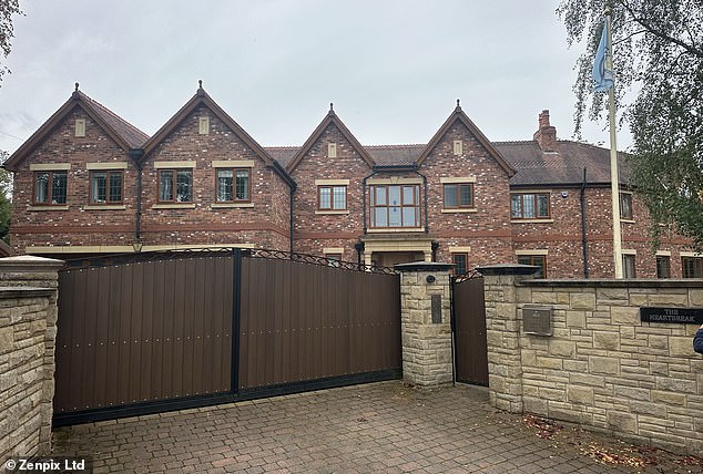 The boxing icon was found at his home (pictured) in Greater Manchester this morning, where a police cordon currently sits outside. His death is not being treated as suspicious