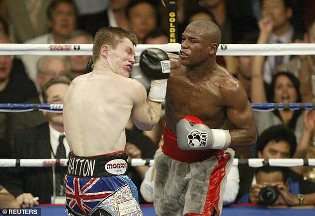 Ricky Hatton takes a punch from Floyd Mayweather Jr. during their WBC welterweight title fight at the MGM Grand in 2007