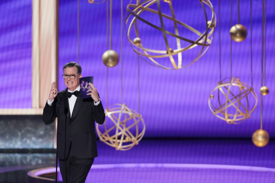 Stephen Colbert announcing an Emmy award.