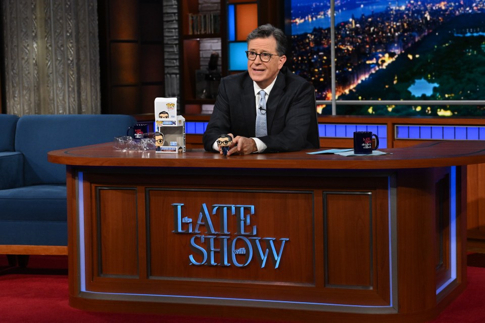 Stephen Colbert on The Late Show set with Funko Pop! figures.
