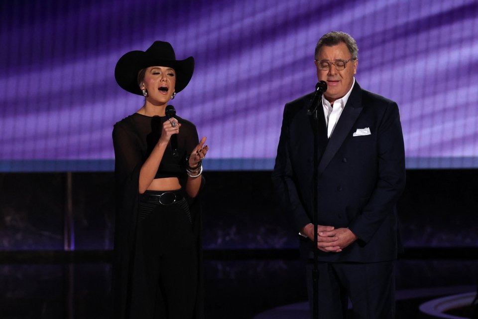 Vince Gill and Lainey Wilson performing at the Emmy Awards.