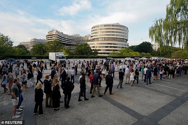 Mourners queue to attend a vigil for conservative activist Charlie Kirk, who was fatally shot during an event at Utah Valley University, at the Kennedy Center in Washington, D.C., U.S., September 14, 2025