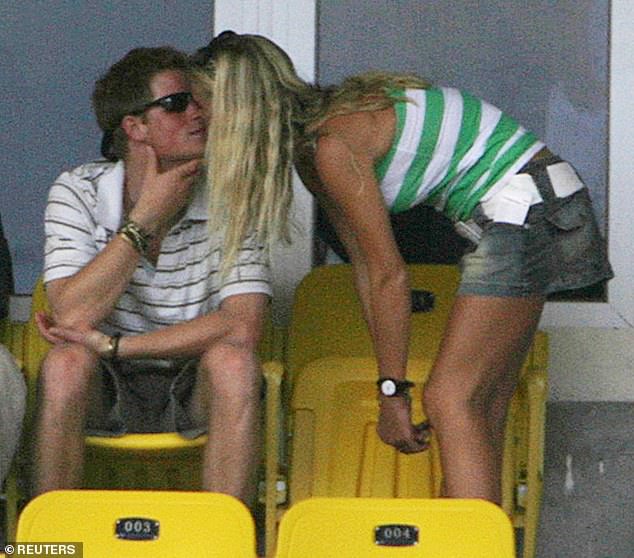 Harry kisses Chelsy at a cricket match. The kiss was seen to break royal protocol