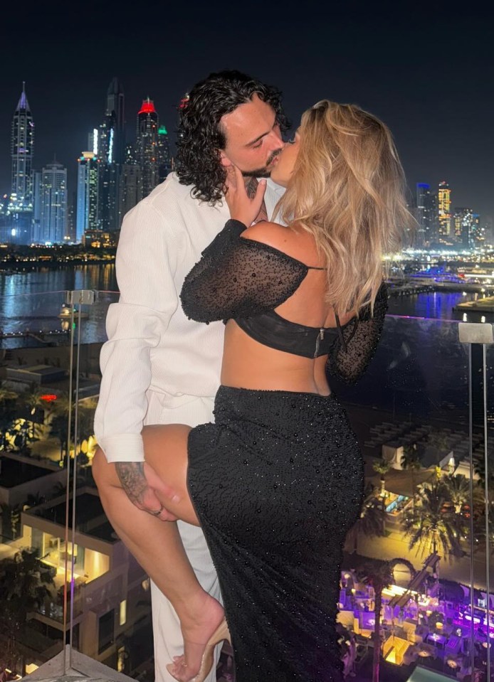 Liberty Poole kissing her new boyfriend.