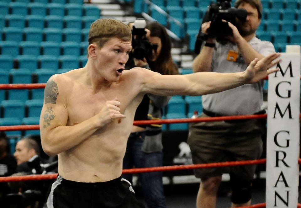 Ricky Hatton boxing in a ring.