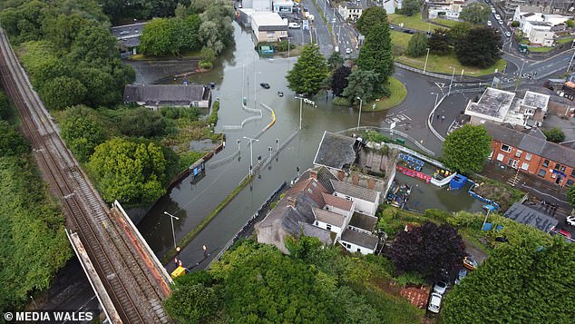 Flooding at the Cwmbwrla roundabout in Swansea this morning following heavy rain