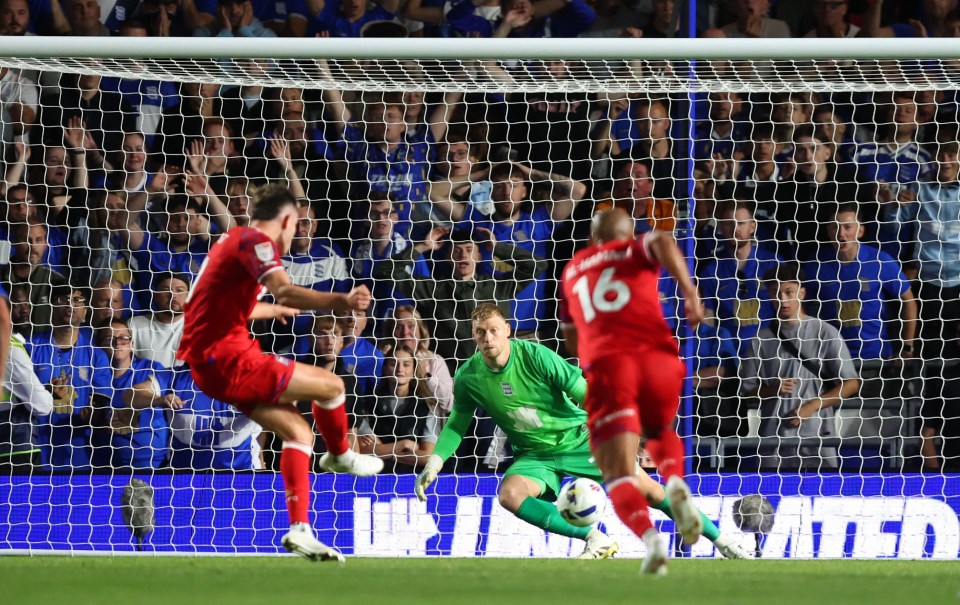 George Hirst scoring a penalty goal for Ipswich Town.