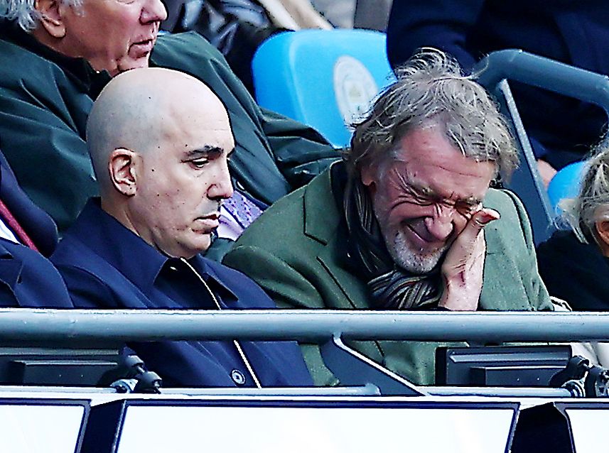 Sir Jim Ratcliffe of Manchester United looking dejected in the stands at a football match.