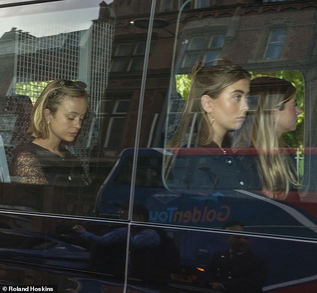 Lady Amelia Windsor (pictured right) is seen at the back of the mini bus alongside Lady Estella Taylor (centre)