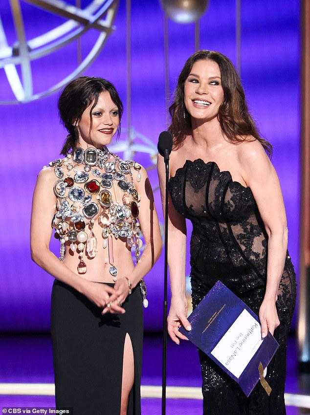 Breakout star of the Addam's Family spin-off 'Wednesday', Jenna Ortega (pictured left with Catherine Zeta-Jones, right) looked like she stumbled out of the shower and got all tangled up in granny's chandelier
