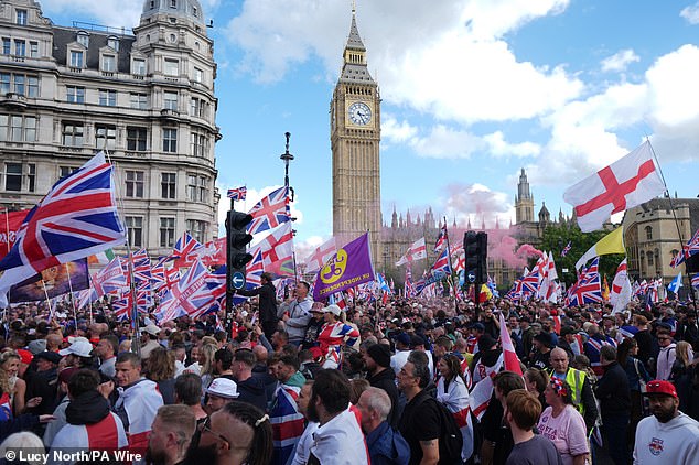 The Unite the Kingdom march was led by Tommy Robinson in Parliament Square on Saturday