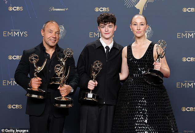 Stephen Graham, Owen Cooper, and Erin Doherty pose with their awards for Adolescence in the press room at the Peacocks Theatre in LA, California, on September 14 2025