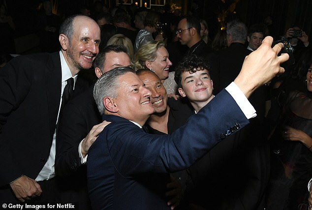 The group marked the momentous moment with a selfie, in which they could not hide their glee