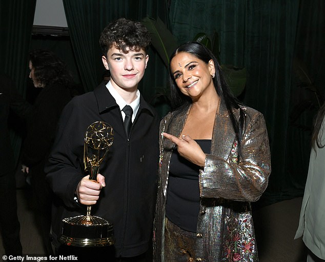 Owen was posing with yet more of the Netflix bosses, as he beamed alongside Bela Bajaria, the streaming service's chief content officer