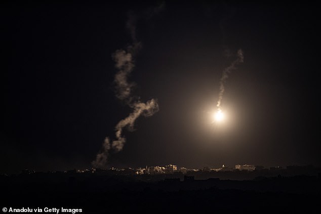 Smoke rises and an illumination flare is seen from the border region as Israel's attacks on the Gaza Strip continue unabated in Israel, on September 15