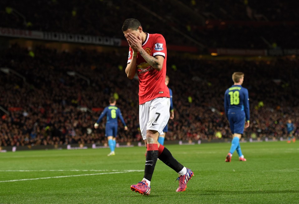 Angel Di Maria of Manchester United covers his face on the field during the FA Cup Quarter Final.