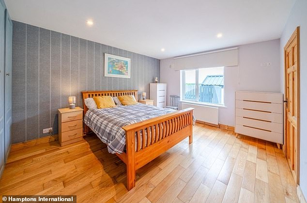 The home has two bedrooms, one with built-in wardrobes and an ensuite