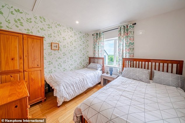 Pictured: One of the cottage's two bedrooms at the bungalow in County Mayo