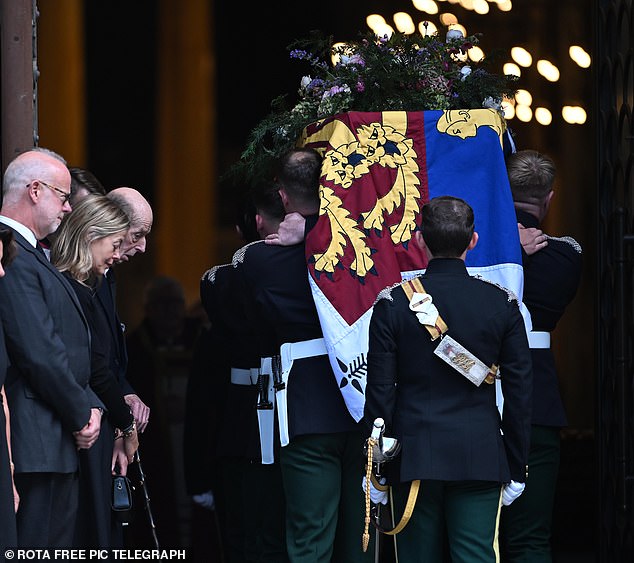A grieving Duke of Kent bowed his head as his late wife's coffin, borne by soldiers of The Royal Dragoon Guards, entered Westminster Cathedral
