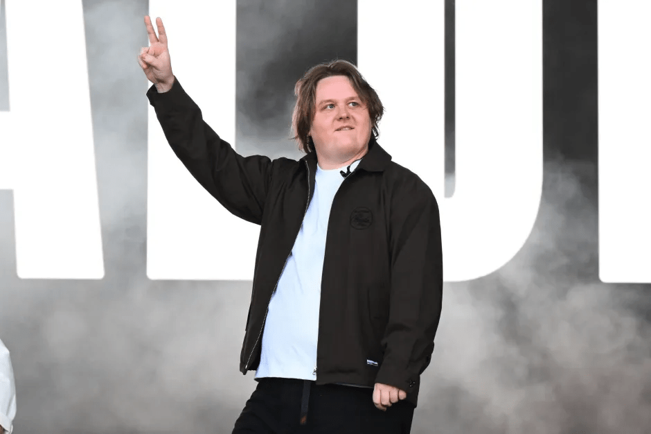 A man giving a peace sign.